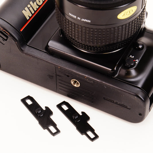 Gancho para tapa de batería para Nikon F-401, N4004, F-501 y N2020 (juego de 2)